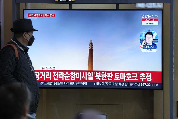 TV screen is seen reporting North Korea's missile launch during a news program