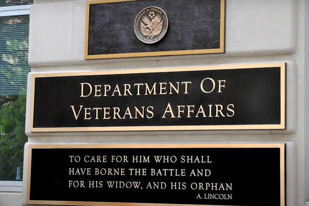 The sign with the  Department of Veterans Affairs motto is seen in Washington, D.C.