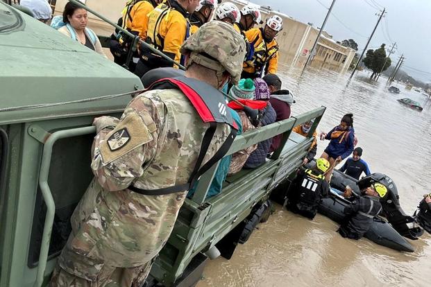 California National Guard soldiers support local first responders in rescue operations. 