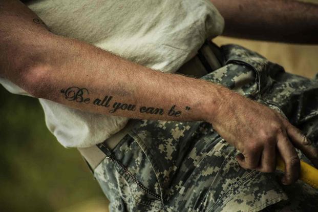 "Be All You Can Be" tattoo on Army soldier.