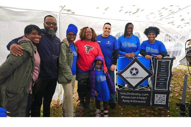 Vets2Industry founder Brian Arrington participates in a Feeding the Homeless event on Thanksgiving in 2019. 