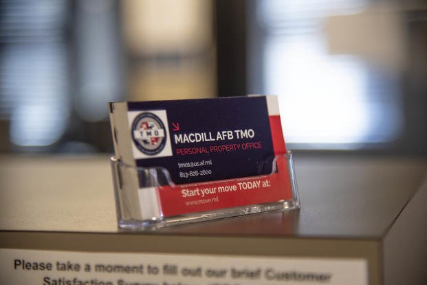 Business cards sit on the front desk at the 6th Logistics Readiness Squadron (LRS) Traffic Management Office (TMO) at MacDill Air Force Base, Florida.