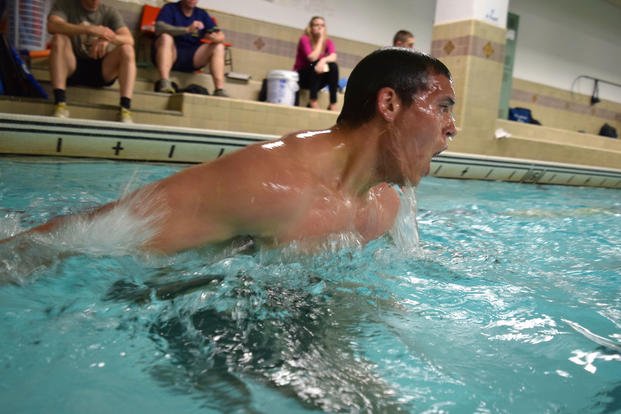 Future sailor and special warfare candidate Zachary Purcell completes the swim portion of the Navy’s physical screening test.