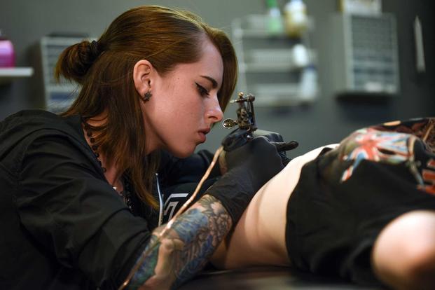 A tattoo artist works in Texas.