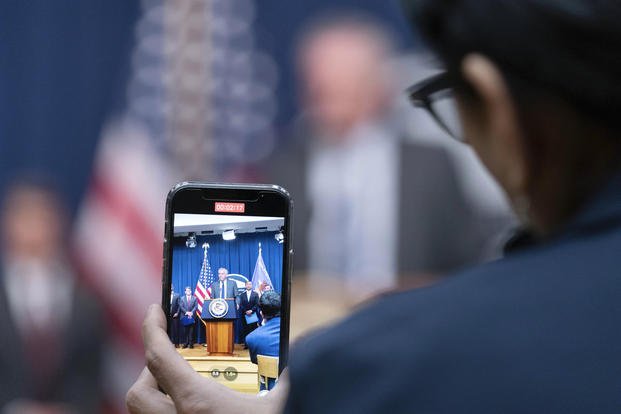 Assistant Secretary for Export Enforcement Matthew Axelrod of the U.S. Commerce Department, is seen on cell phone