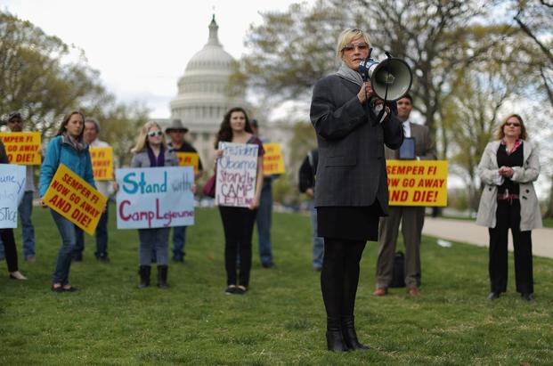 Consumer advocate Erin Brockovich addresses a rally in Washington, D.C. 