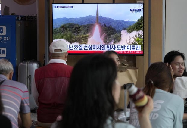 image of North Korea's missile launch during a news program