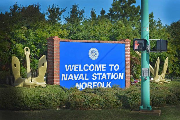 Welcome to Naval Station Norfolk sign and anchor.