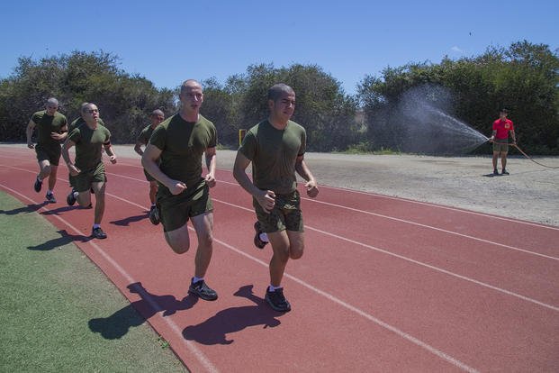 Recruits run during a physical training session at Marine Corps Recruit Depot, San Diego.