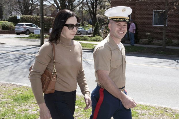 Marine Maj. Joshua Mast and his wife, Stephanie, arrive at Circuit Court