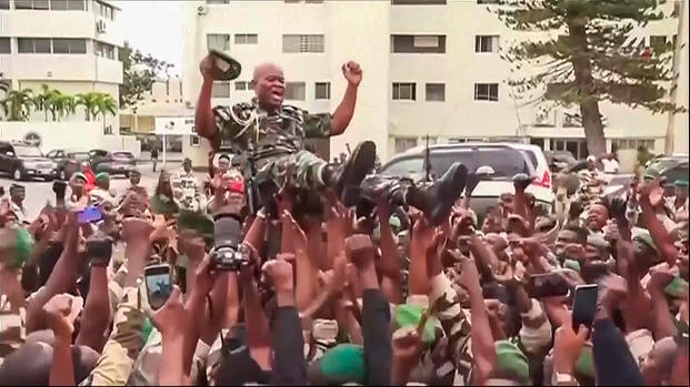 This video grab shows soldiers holding General Brice Clothaire Oligui Nguema aloft.