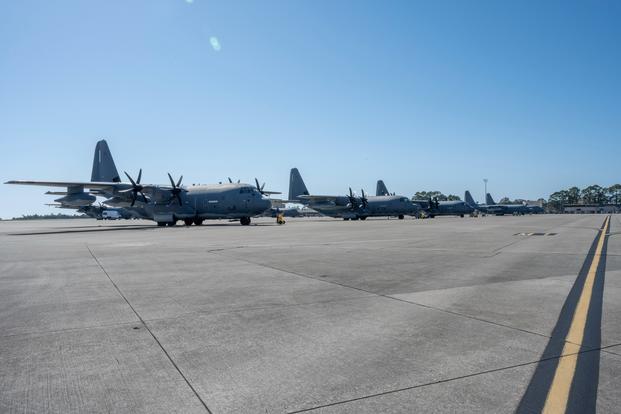 A line of AC-130J Ghostrider and MC-130H Combat Talon II aircrafts sit on the flightline at Hurlburt Field, Fla., Feb. 6, 2023.
