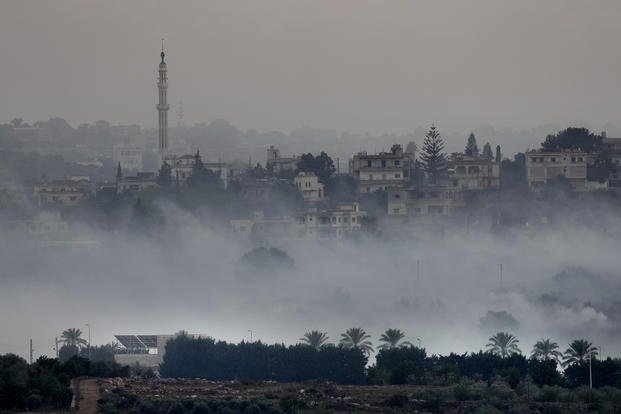 Israeli artillery shelling smoke covers Dahaira, Lebanon