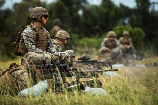 U.S. Marines  participate in an M240B machine gun range on Camp Hansen