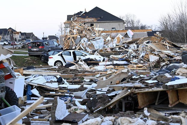 Debris covers the area around homes destroyed in the West Creek Farms neighborhood of Clarksville, Tenn.