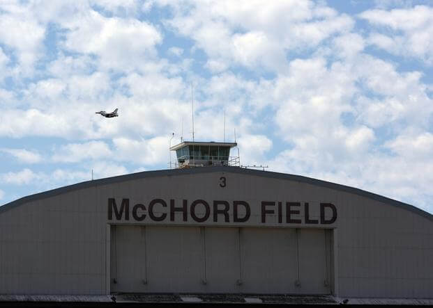 U.S. Air Force Maj. Jeffrey Downie, Thunderbird #8, flies an F-16 Fighting Falcon aircraft above the McChord Field flightline in preparation for the Joint Base Lewis-McChord Air Show and Warrior Expo before landing at JBLM, Washington, July 12, 2023. 