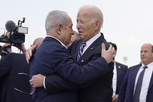 President Joe Biden is greeted by Israeli Prime Minister Benjamin Netanyahu.