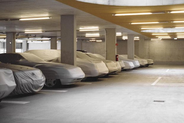 Vehicles parked with covers. 