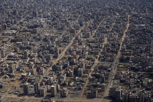 Destroyed buildings are seen from an airplane from the U.S. Air Force overflying the Gaza Strip