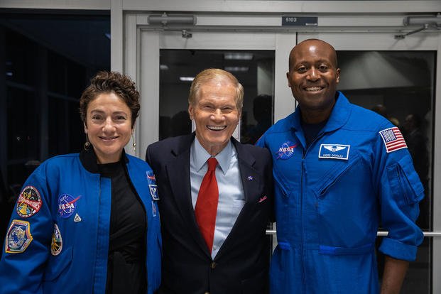 NASA administrator Bill Nelson, center, visits with NASA astronaut Jessica Meir and then-astronaut candidate Andre Douglas during launch countdown activities for NASA’s Artemis I mission on Aug. 29, 2022, at the agency’s Kennedy Space Center in Florida. 