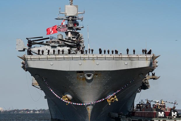 The Wasp-class amphibious assault ship USS Bataan returns to Naval Station Norfolk, Virginia.