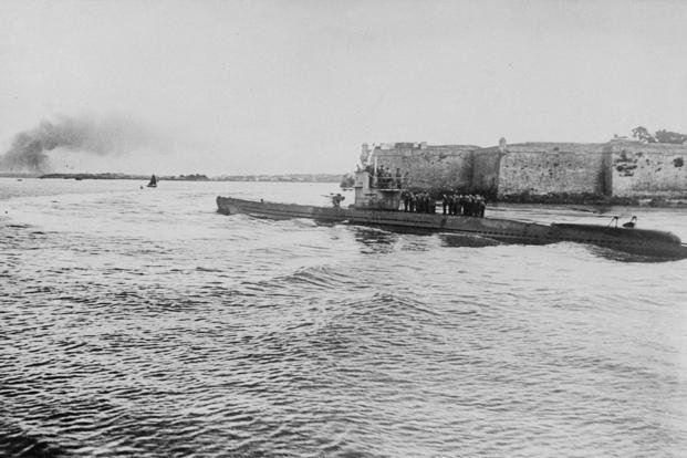 This photo provided by the German government shows a German submarine, or U-boat, after returning to a French port on the English Channel in August 1940 after ‘an extensive tour,’ according to the government censor in Berlin. 