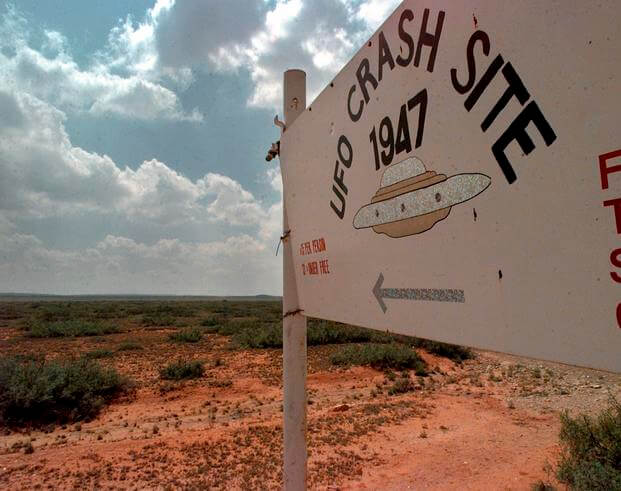 A sign directs travelers to the start of the "1947 UFO Crash Site Tours" in Roswell, N.M.,