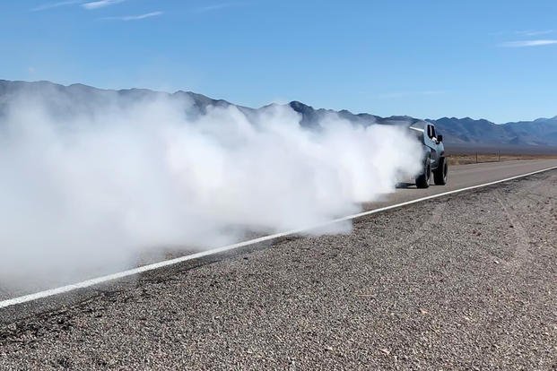 That’s not a burnout; it’s a button-activated defensive smoke screen. 