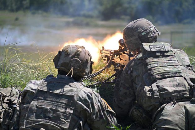 Virginia National Guard engage targets from a support by fire position during a blank fire iteration of Immediate Response 24 at the Libava Training Area, Czech Republic