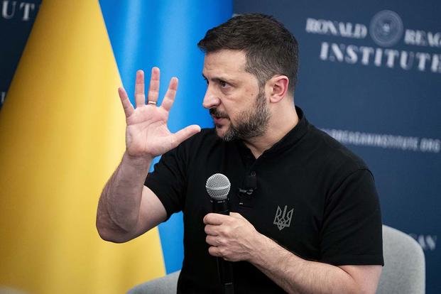 Ukrainian President Volodymyr Zelensky answers questions