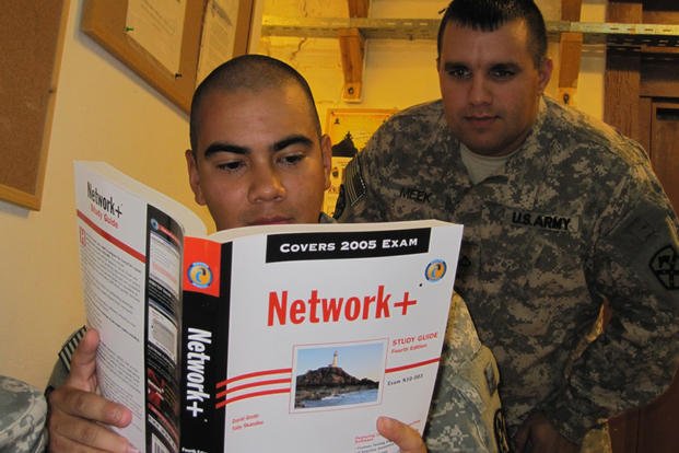 A soldier with the 15th Special Troops Battalion, 15th Sustainment Brigade, studies for a computing technology exam. 