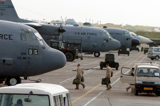 C-130 aircrew board their aircraft at Karshi-Khanabad Air Base, Uzbekistan