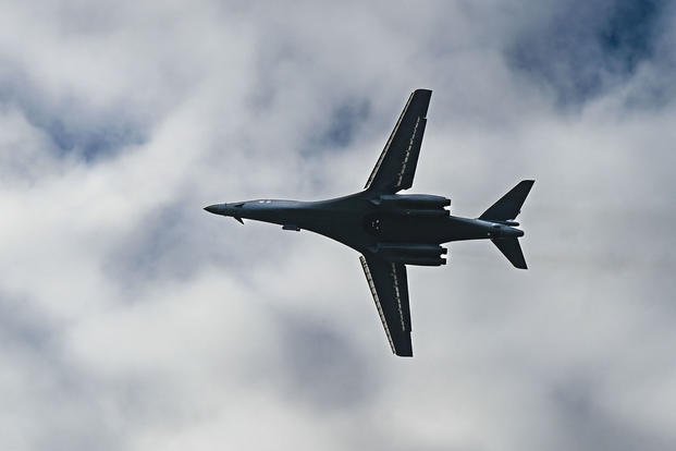 A U.S. Air Force B-1B Lancer assigned to the 28th Bomb Wing prepares to land for a hot-pit refuel at Grand Forks Air Force Base, N.D.