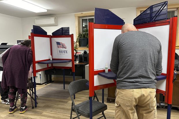 Voters fill out ballots in the municipal offices in Cabot, Vermont, on Election Day, Nov. 5, 2024. 