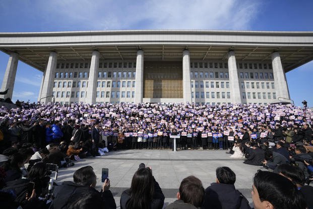 Members of the main opposition Democratic Party stage a rally against South Korean President Yoon Suk Yeol
