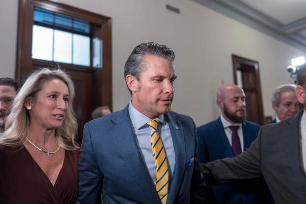 Pete Hegseth, President-elect Donald Trump's nominee to be defense secretary, is joined by his wife Jennifer Rauchet