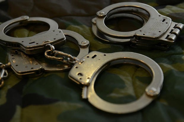 Handcuffs lay on a table at Ramstein Air Base, Germany