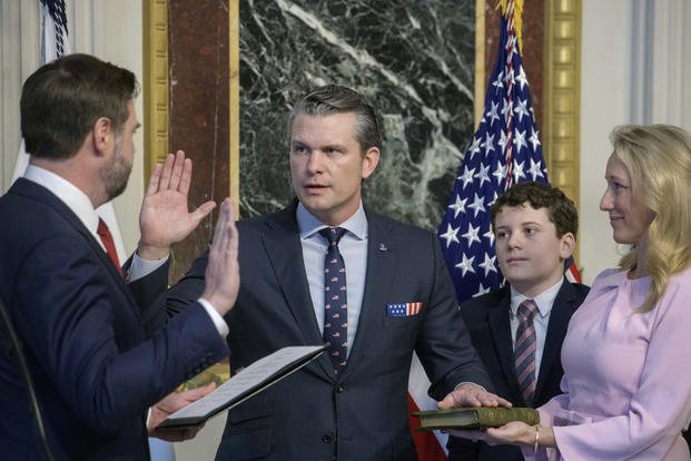 Vice President JD Vance, from left, swears in Pete Hegseth to be Secretary of Defense