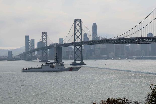 Coast Guard Cutter Waesche approaches the San Francisco Bay Bridge