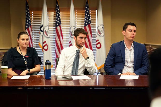 Members of the USAID Presidential Management Fellows (PMF) Program meet with USAID administrator Mark Green in Washington, D.C.