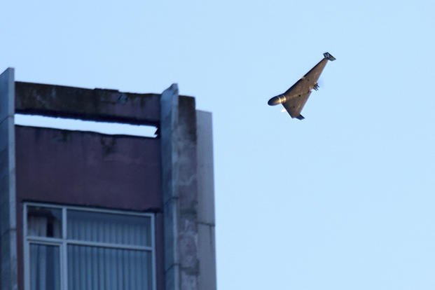 A Russian drone attacks a building during Russia's massive missile and drone air attack in Kyiv.