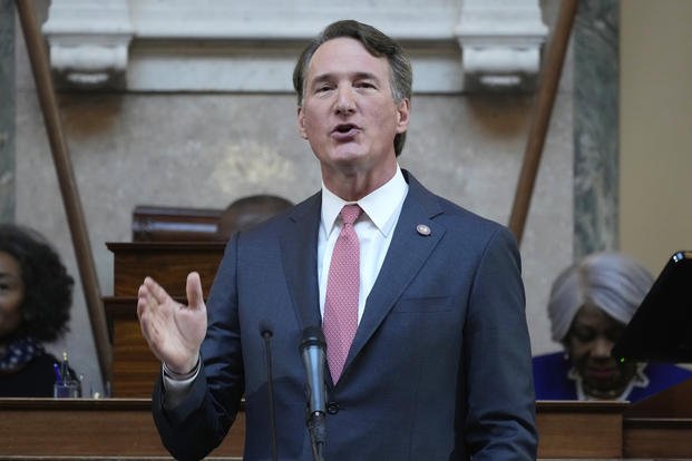 Virginia Gov. Glenn Youngkin gestures as he delivers his annual State of the Commonwealth address