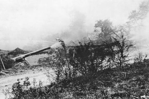 Battery E of the 56th Artillery (Coast Artillery Corps) fires a salvo during the Meuse–Argonne Offensive in World War I.