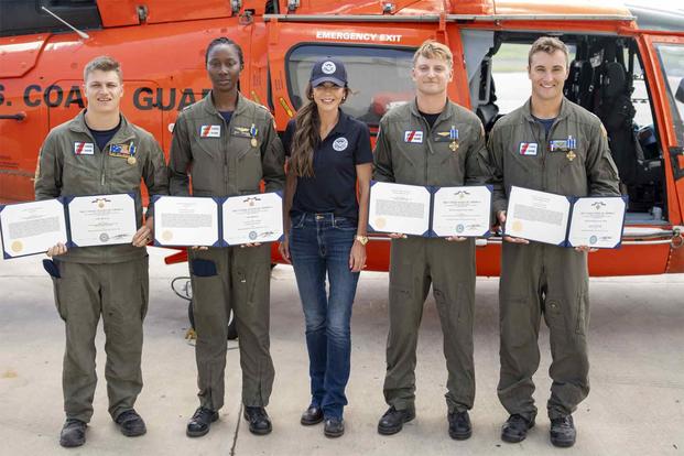 Secretary Kristi Noem presents medals to Coast Guard heroes
