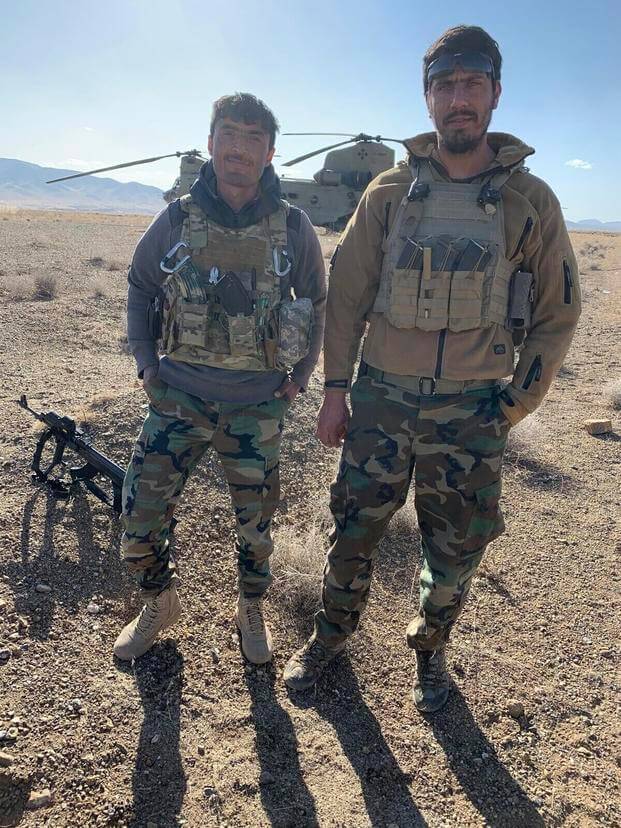 Abdul Rahman Waziri, right, an Afghan refugee who was fatally shot at his Houston apartment complex