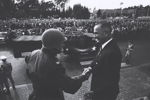 During his visit to West Berlin, Vice President Lyndon B. Johnson greets Col. Glover S. Johns Jr., Aug. 20, 1961. (CIA photo)