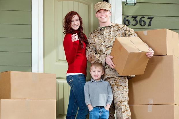 Family with moving boxes