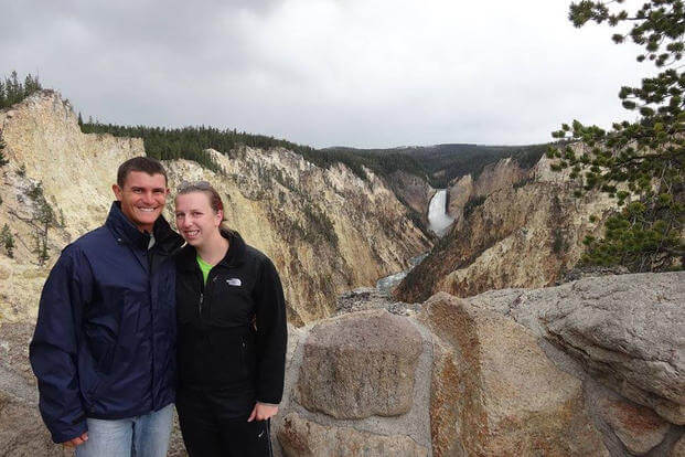 Kendall and John Gomber smile in Yelllowstone National Park, Wyoming. (Photo: Courtesy of John Gomber.)