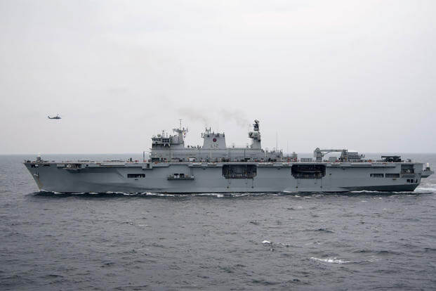 The Royal Navy ship HMS Ocean (L12) transits the Arabian Gulf alongside the USS Dwight D. Eisenhower (CVN 69), Nov. 25, 2016. (U.S. Navy photo/ Petty Officer 3rd Class Anderson W. Branch)