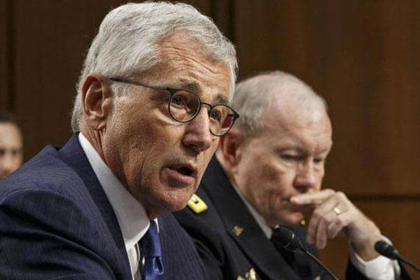 Defense Secretary Chuck Hagel, left, and Army Gen. Martin Dempsey, chairman of the Joint Chiefs of Staff, appear before the Senate Armed Services Committee, Tuesday, Sept. 16, 2014. (AP Photo/J. Scott Applewhite)